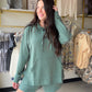Easygoing and elevated, the Laguna Dune Hoodie is your new everyday essential. Made from our signature sand-washed scuba fabric with a buttery-soft, spongy hand feel, this pullover delivers comfort without compromising on style. It features a slouchy mock neck with adjustable drawstrings, relaxed raglan sleeves, and a longline silhouette with 8" side slits and a subtle high-low hem for added movement.