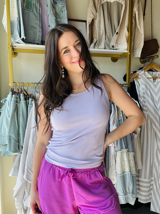 The&nbsp;Hold Tight OG Tank&nbsp;is the original, the icon, the MVP of your wardrobe lineup. With its buttery-soft fabric and just-right stretch, this tank hugs you in all the right places while keeping you comfy all day long. The classic scoop neckline and sleek silhouette make it the perfect layering piece or a standalone stunner on warmer days.

From running errands to lounging at home, or even dressing it up for a night out, the&nbsp;Hold Tight OG Tank&nbsp;is your go-to for effortless style. It’s not j