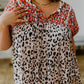 This plus-size blouse features a unique boho leopard print and classic tassel details. The lightweight shift silhouette is perfect for the office while the patchwork adds a touch of style. Perfect for everyday wear.