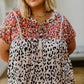 This plus-size blouse features a unique boho leopard print and classic tassel details. The lightweight shift silhouette is perfect for the office while the patchwork adds a touch of style. Perfect for everyday wear.