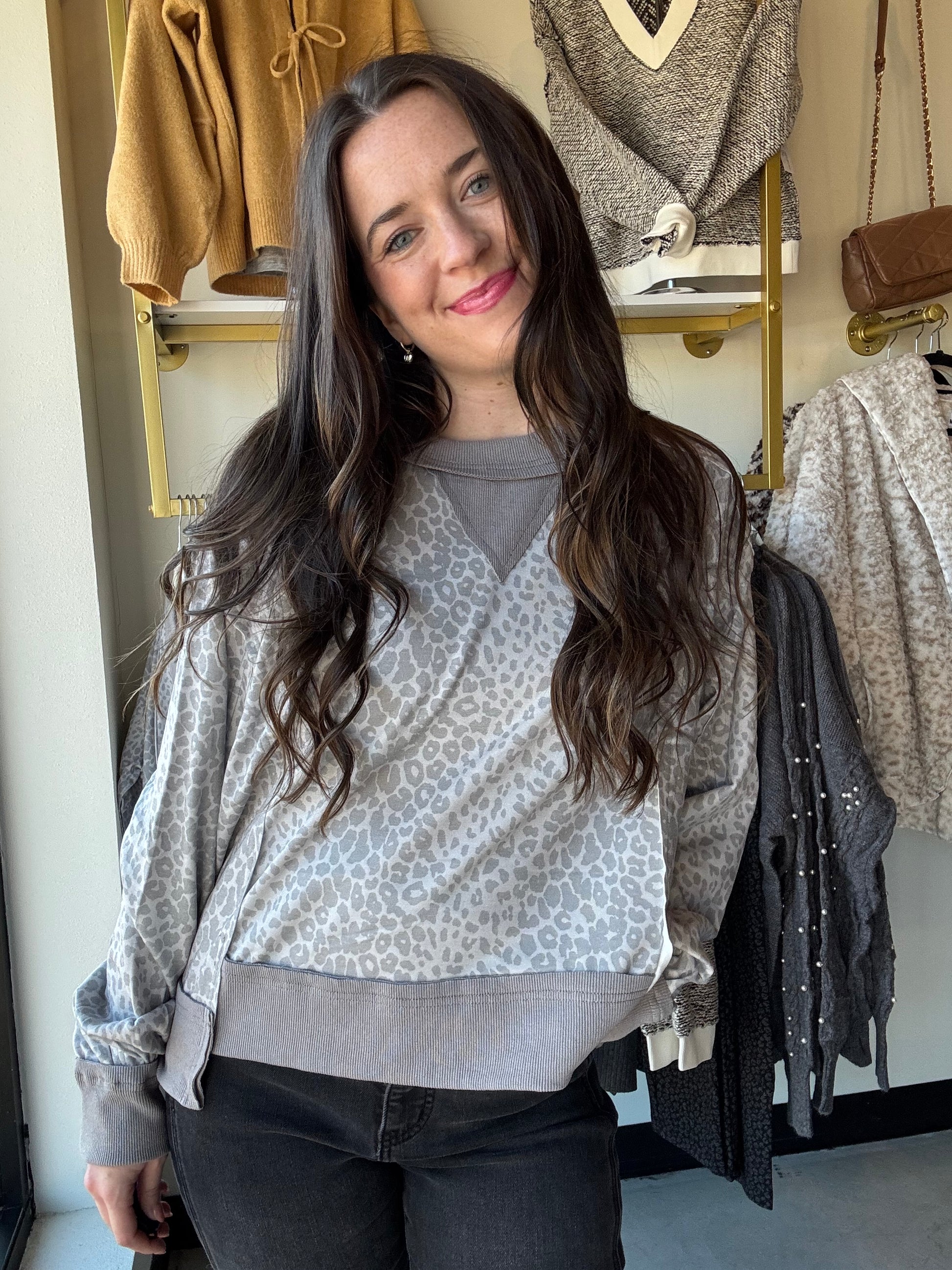 Wrap yourself in cozy charm with the Grey Leopard Crewneck Pullover. Featuring silky smooth fabric that feels like a gentle hug, this playful piece boasts a classic crewneck and a fun reversed hemline that adds a quirky twist to your casual look. Perfect for lounging or stepping out in style, it’s comfort with a cheeky little edge.

White Birch&nbsp;