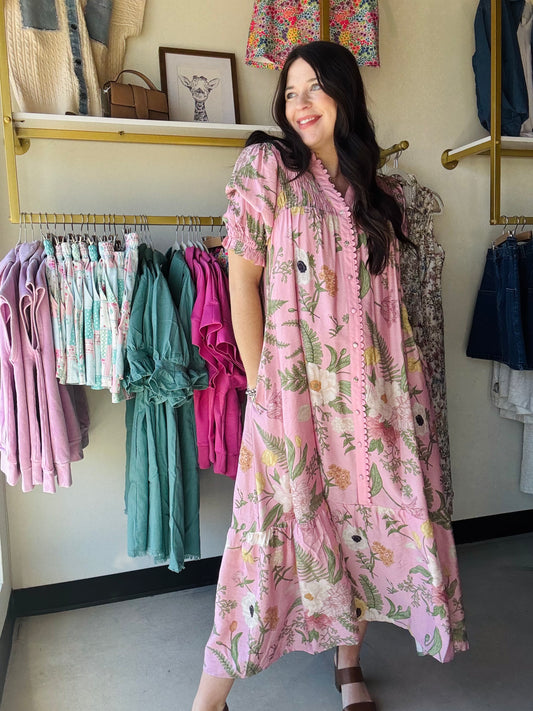 Umgee

Floral Smocked Button-Front Midi Dress

Key Features
• V-neck with ruffle trim
• Smocked yoke
• Short puff sleeves
• Lace trim 
• Side pockets
• Lined
Fabric Contents
• 85% Rayon
• 15% Nylon
