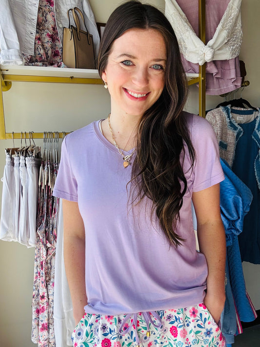 We know we're always on the lookout for a good, comfy basic! This&nbsp;basic tee is definitely one of those pieces! It's&nbsp;comfy and a perfect fit&nbsp;that makes it so easy to wear and the colors make styling and layering it a breeze! These top features short sleeves, a V-neck, and a rounded hemline.&nbsp;

Order your normal size for a true fit or size&nbsp;up for a more relaxed style