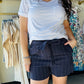 Michelle Mae

Stay cool and stylish this summer with our Libby Linen Shorts. Made from breathable linen, with a stretchy waistband and attached tie belt for a comfortable fit. Plus, pockets for added convenience. Perfect for any summer adventure.

Fabric: 85% Linen, 10% Rayon, 4% Cotton, 1% Polyester
Fit: Runs true to size&nbsp;
Model Sizing: Sophie is wearing the size small
Made in the USA