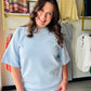 Your new favorite everyday top. The Frost Modal Luxe Short Sleeve by Rae Mode is made from a silky-smooth modal poly scuba fabric that feels incredibly soft against the skin and holds its shape all day. The relaxed, oversized raglan silhouette with a dropped shoulder gives it that effortlessly cool, laid-back vibe you'll reach for again and again.

The 4x2 ribbed contrast details at the neckline and cuffs add a subtle elevated touch that takes it beyond basic — pair it with leggings, joggers, or your favori