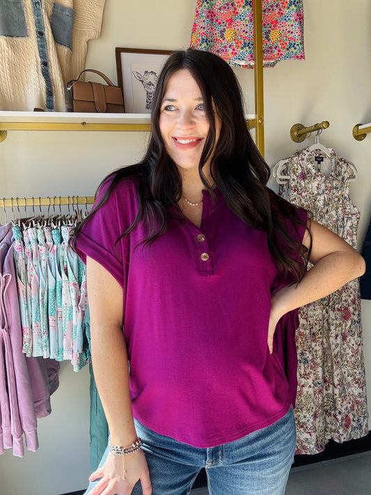 Staccato&nbsp;

Elevate your everyday wardrobe with this versatile button neck tee. Crafted from soft, breathable jersey fabric, this short-sleeve top features a classic solid design and a distinctive slit neckline with button detailing. Perfect for layering or wearing solo, it transitions seamlessly from casual days to relaxed evenings. The comfortable fit and quality construction make it a wardrobe essential you'll reach for again and again.