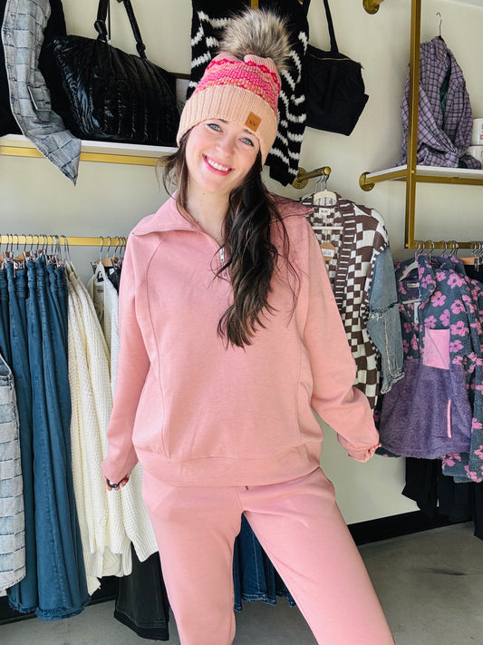 Say hello to our dreamy half-zip pullover, made from the softest modal fabric you’ll ever wear! Designed with banded sleeves and hem, it’s the perfect blend of comfort and effortless style. This set also comes with the perfect jogger pants to complete the look! Made for life on the go, this wrinkle-resistant pullover is your ultimate travel companion—just toss it in your bag and pull it out looking crisp and ready to wear. The versatile half-zip design lets you customize your look and comfort, while the lux