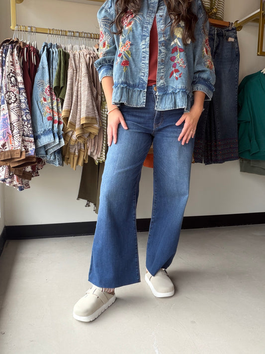 Meet the Meg High Rise Wide Leg Denim by Kut from the Kloth — the wide-leg jean that does everything right. A high-rise waist elongates your silhouette while the sweeping wide leg creates that effortlessly cool, fashion-forward look you've been chasing.

In the beautiful Harmony wash, these jeans pair seamlessly with everything from fitted tees to flowy blouses. The 93% Cotton, 6% Polyester, 1% Spandex blend gives you the structure of a classic denim with just enough stretch for all-day comfort.

High 