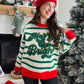 Wrap yourself in holiday cheer with this festive crewneck sweater! Featuring a cozy thick knit perfect for chilly winter days, it showcases vibrant red accents paired with cheerful green stripes that capture the spirit of the season. The playful color combination makes it an instant conversation starter at holiday gatherings. Whether you're decorating, caroling, or cozying up by the fire, this merry &amp; bright sweater brings warmth and festive flair to your seasonal wardrobe.

Bibi