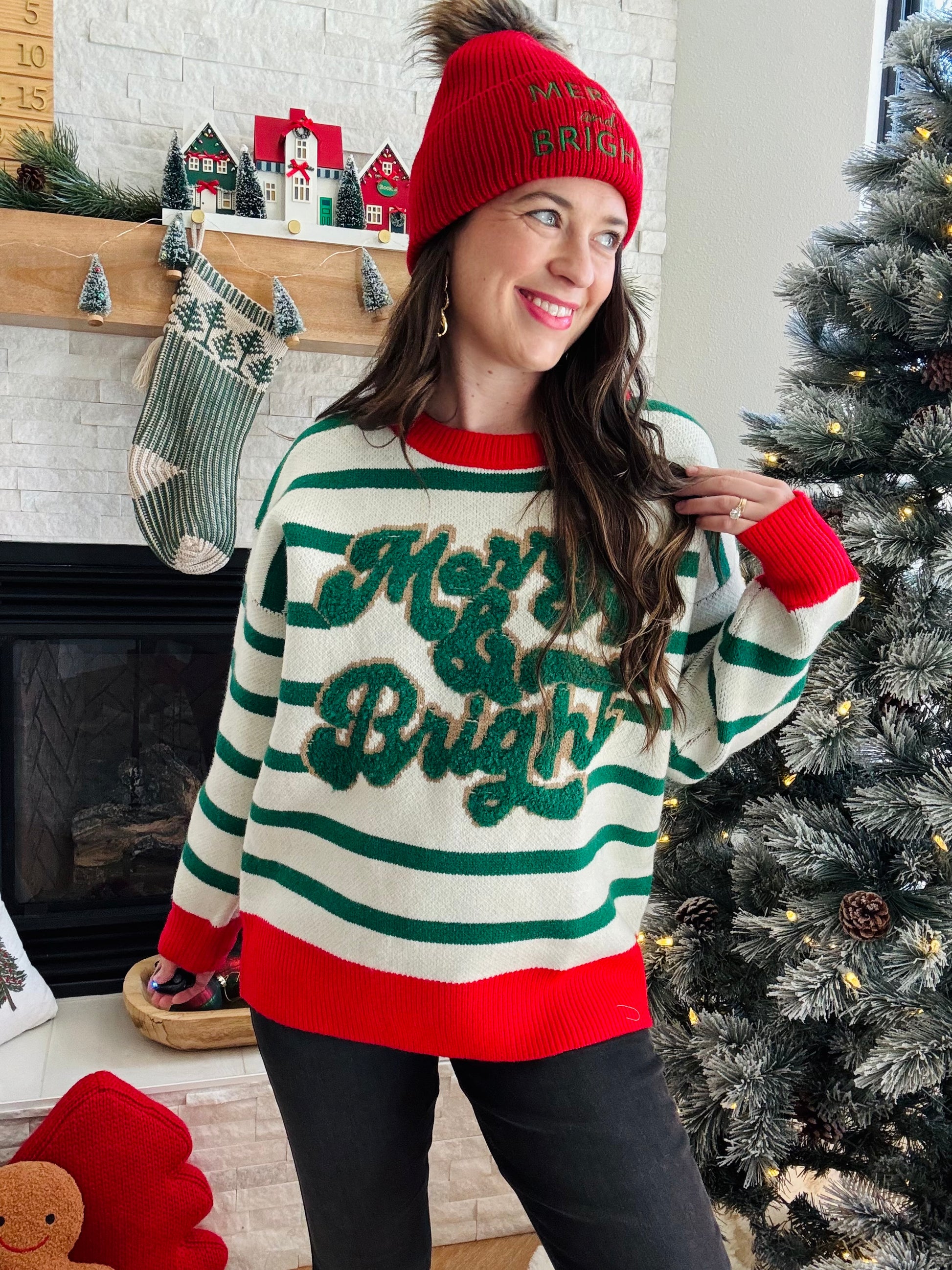 Wrap yourself in holiday cheer with this festive crewneck sweater! Featuring a cozy thick knit perfect for chilly winter days, it showcases vibrant red accents paired with cheerful green stripes that capture the spirit of the season. The playful color combination makes it an instant conversation starter at holiday gatherings. Whether you're decorating, caroling, or cozying up by the fire, this merry &amp; bright sweater brings warmth and festive flair to your seasonal wardrobe.

Bibi