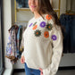 Michelle Mae

Embrace the season in this beautifully crafted fall floral sweater. Featuring a soft, luxurious fabric that feels gentle against your skin, this beige piece showcases delicate floral detailing perfect for autumn styling. Layer it effortlessly over your favorite basics or wear it solo for a cozy, sophisticated look. The comfortable fit makes it ideal for transitional weather, whether you're heading to the office or enjoying a casual weekend. A timeless addition to your fall wardrobe.

Fabric Co
