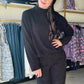 Upgrade your loungewear collection with our Mind You Mock Neck Top. This cozy black top features a high-end mock neck, perfect for staying comfortable and stylish. Ideal for both leisure and work from home settings, this top is a must-have for any fashion-forward individual.

Brand: Sadie &amp; Sage

Complete the set with the Mind You Wide Leg Pants