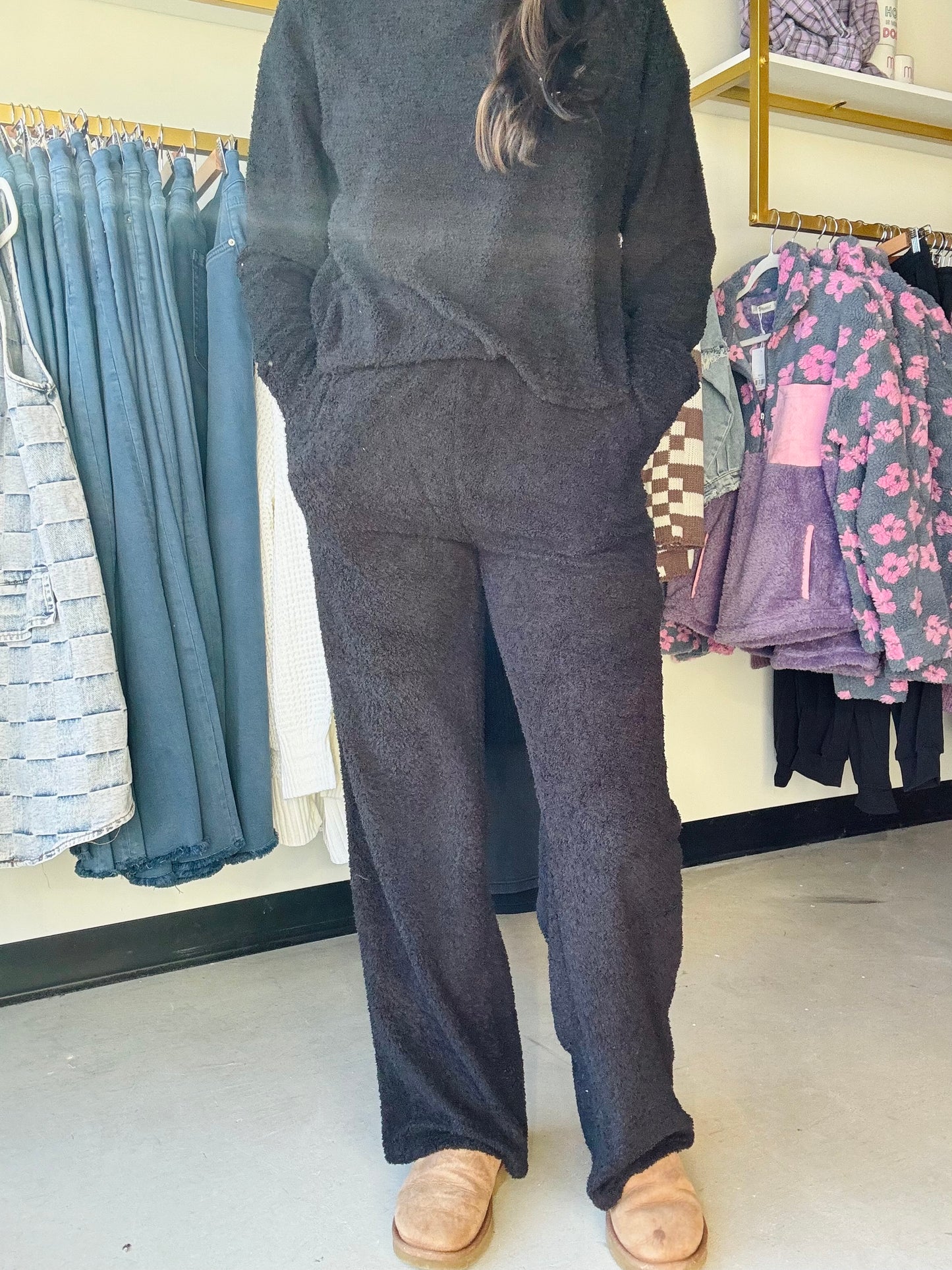 These Mind You Wide Leg Pants offer luxurious comfort with their high-end design and soft, fuzzy fabric. The wide leg construction allows for unrestricted movement and the classic black color adds a touch of elegance to your loungewear collection. Relax in style and comfort with these wide leg pants.

Brand: Sadie &amp; Sage

Complete the set with the Mind You Mock Neck Top!&nbsp;