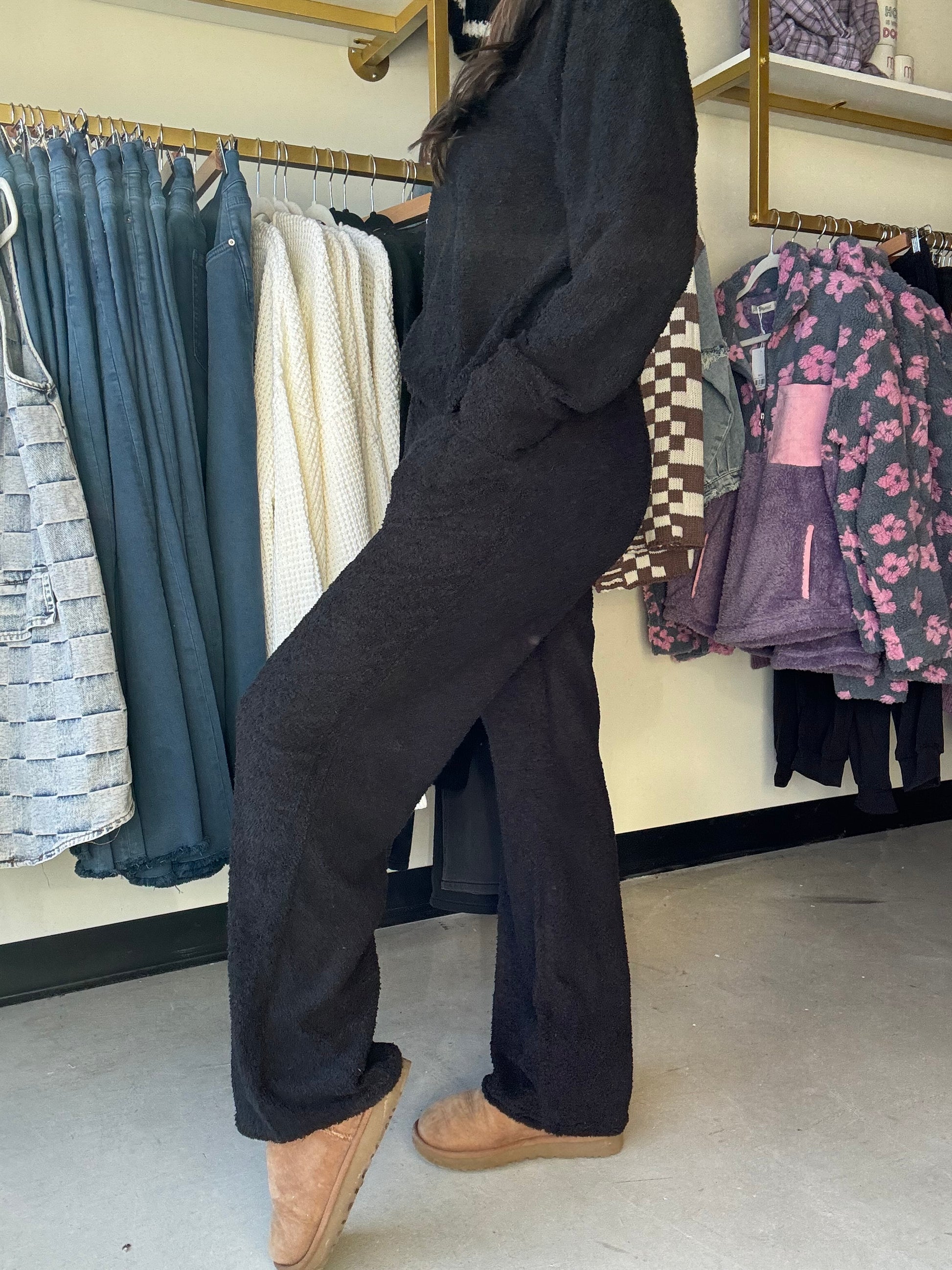 These Mind You Wide Leg Pants offer luxurious comfort with their high-end design and soft, fuzzy fabric. The wide leg construction allows for unrestricted movement and the classic black color adds a touch of elegance to your loungewear collection. Relax in style and comfort with these wide leg pants.

Brand: Sadie &amp; Sage

Complete the set with the Mind You Mock Neck Top!&nbsp;