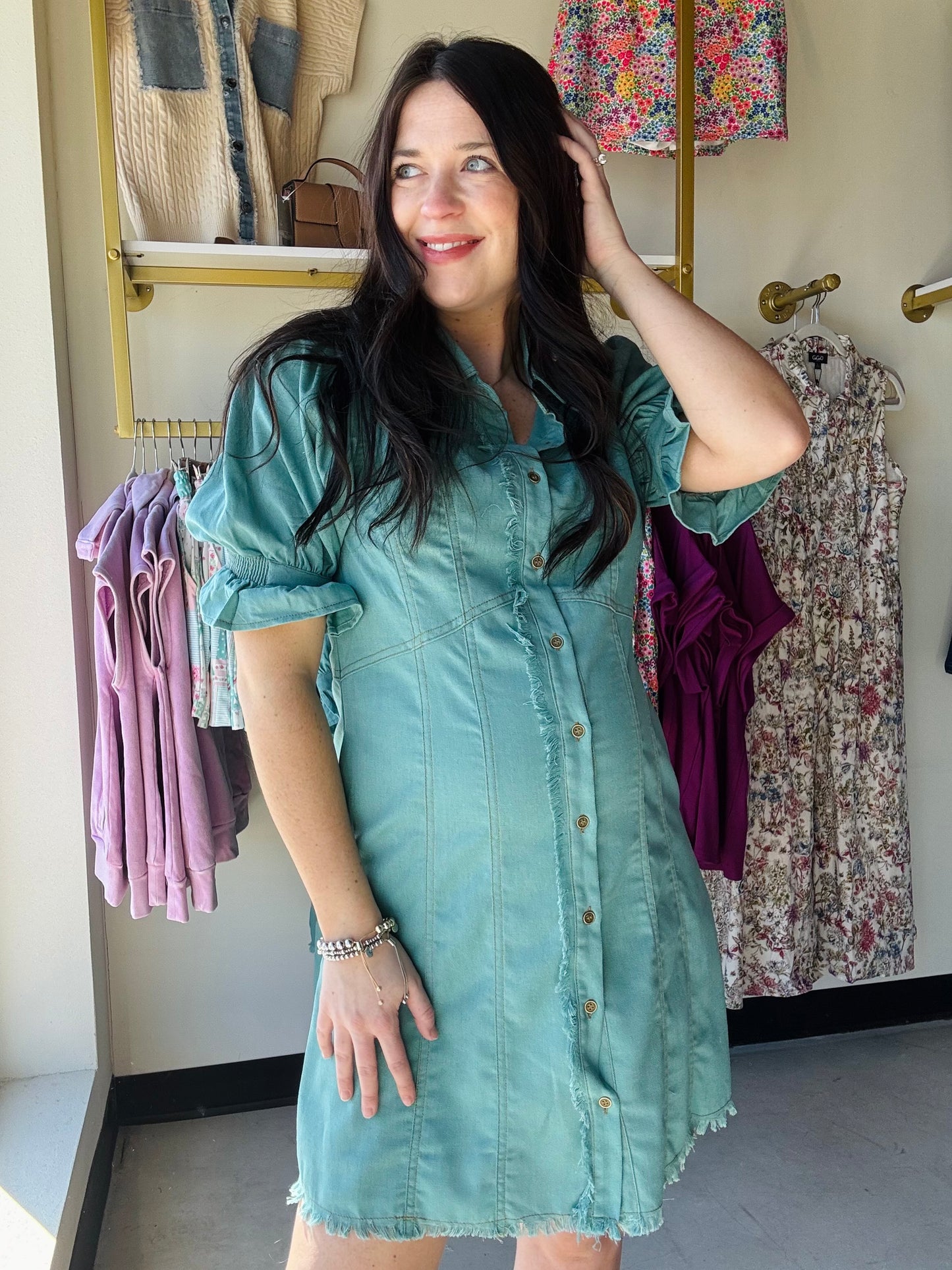 Gigio

Elevate your wardrobe with this mint linen puff sleeve dress, featuring a classic button-down silhouette and thoughtfully designed seaming details. The voluminous puff sleeves add a touch of romance and dimension, while frayed edges throughout create an effortlessly refined aesthetic. Crafted from breathable linen, this versatile piece transitions seamlessly from casual daytime wear to evening occasions. Perfect for warm weather styling, the relaxed fit and timeless design make it a wardrobe essentia