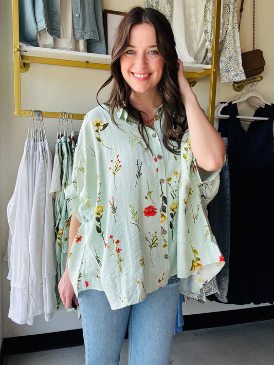 Expertly crafted with a stunning floral print, the Mint Mix Floral Button Up offers a versatile and stylish addition to any wardrobe. Its boxy fit provides a comfortable and modern silhouette, while the full button up design adds a touch of sophistication. This top is not lined and offers no stretch for a structured and polished look.