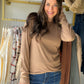 Meet the Mocha Solid Brushed Long Sleeve from Staccato, a soft everyday staple made for effortless layering. The wide crew neckline gives it a relaxed, easy-to-style look, while the micro-brushed finish adds a cozy feel to this classic solid top. Wear it on its own with denim or tuck it into your favorite trousers and skirts for a polished everyday outfit.

Why you’ll love it:

Wide crew neckline
Classic long-sleeve silhouette
Solid mocha color
Soft micro-brushed finish
Easy layering piece for everyday wear
