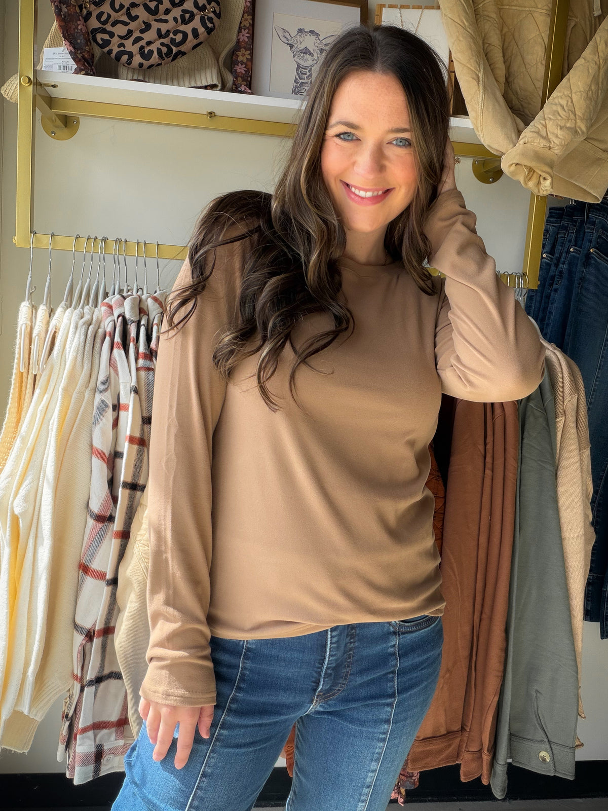 Meet the Mocha Solid Brushed Long Sleeve from Staccato, a soft everyday staple made for effortless layering. The wide crew neckline gives it a relaxed, easy-to-style look, while the micro-brushed finish adds a cozy feel to this classic solid top. Wear it on its own with denim or tuck it into your favorite trousers and skirts for a polished everyday outfit.

Why you’ll love it:

Wide crew neckline
Classic long-sleeve silhouette
Solid mocha color
Soft micro-brushed finish
Easy layering piece for everyday wear