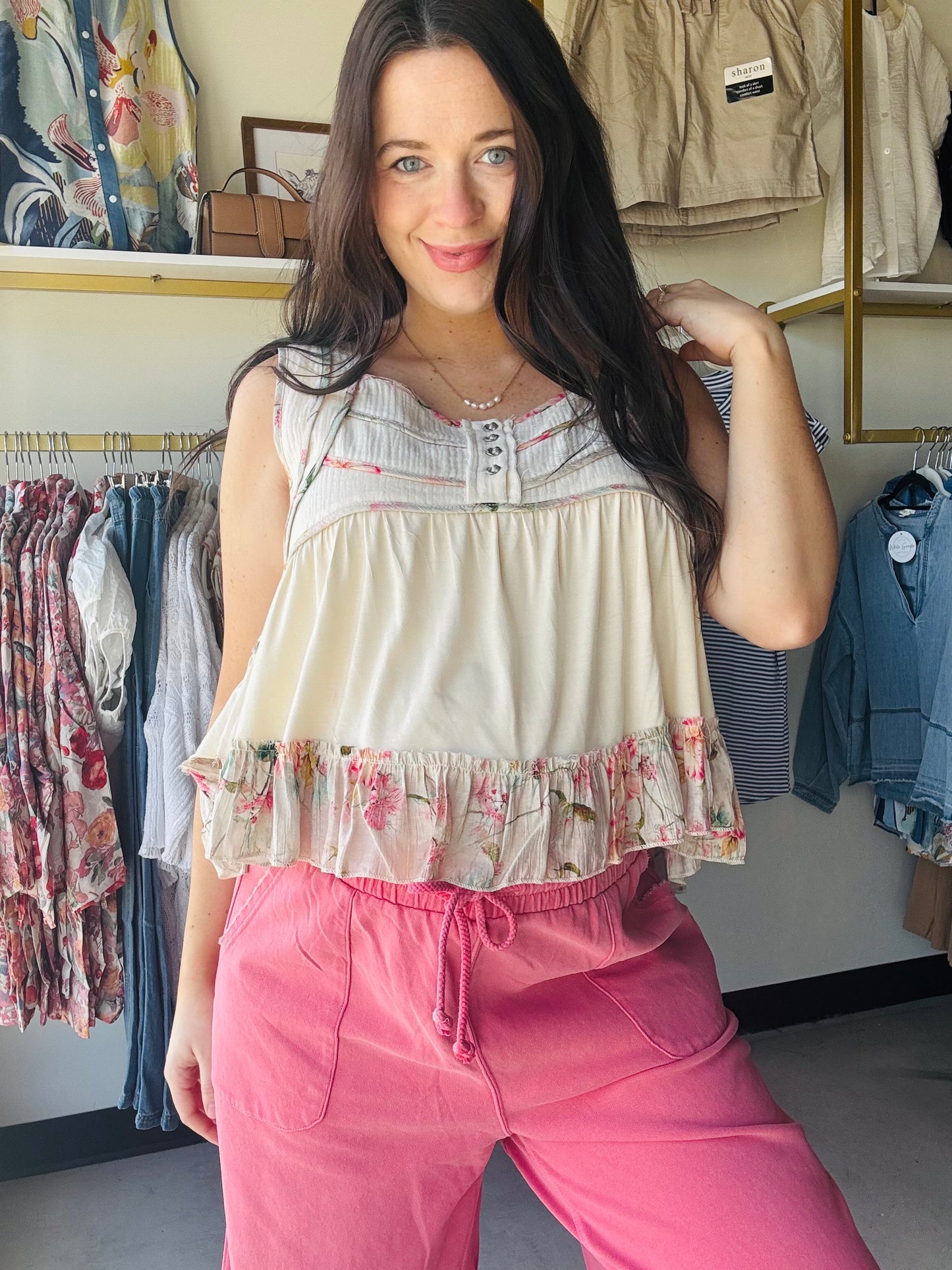 POL

Indulge in the buttery-soft feel of POL’s signature jersey fabric. This feminine natural floral babydoll tank pairs a modern square neckline with flirty floral trim for an effortless, boho-chic look. Lightweight and cropped, it’s the ultimate fusion of comfort and high-end style• Signature ultra-soft POL jersey fabric.

• Flattering square neckline and sleeveless cut.
• Feminine floral trim and ruffle hem.
• Breathable, lightweight comfort for all-day wear.
• Modern cropped fit for easy styling.
• Dura