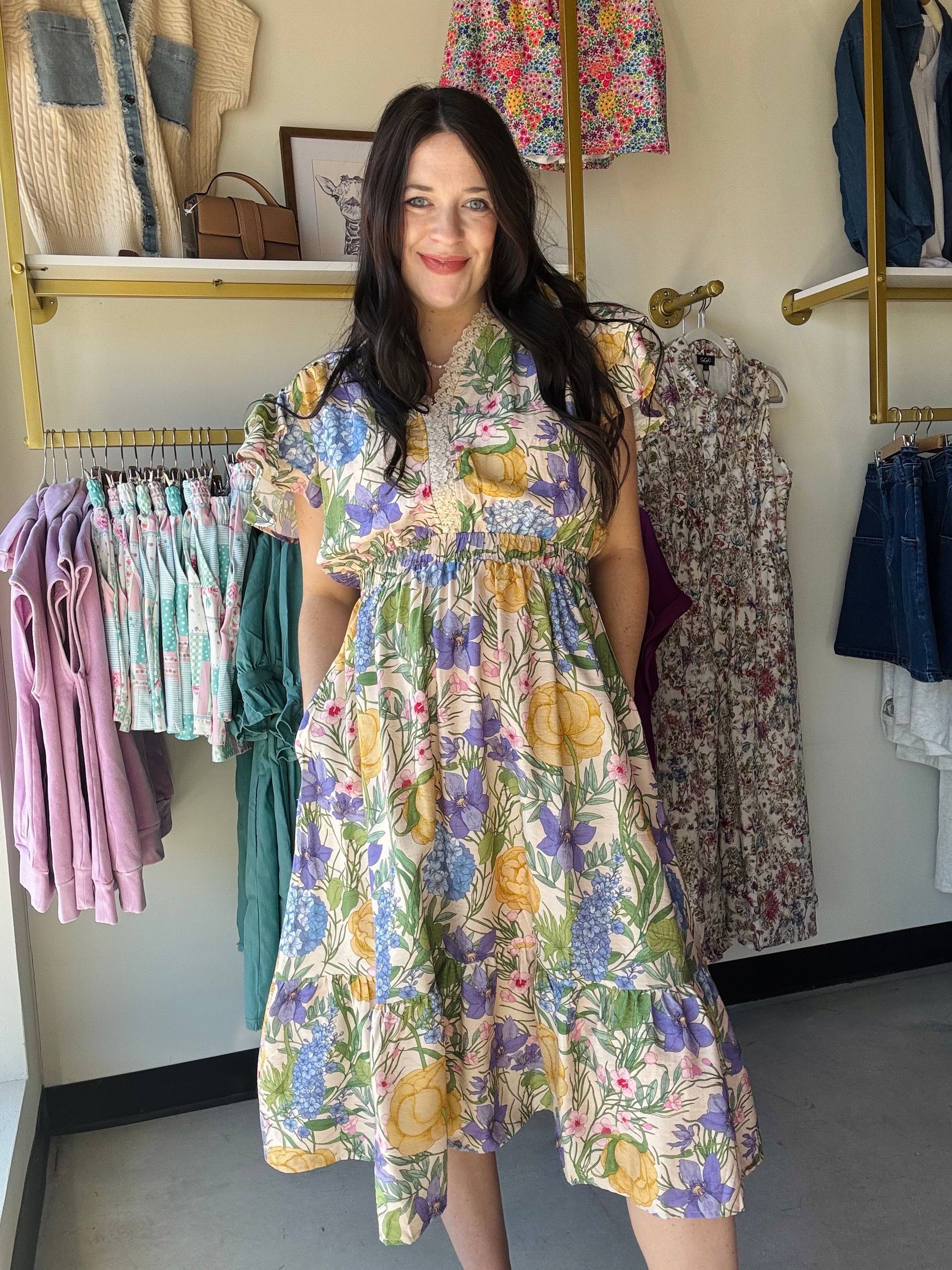 Umgee

Flutter Sleeve Floral Lace Trim Midi Dress

Key Features
• V-neck with lace trim
• Side pockets 
• Elastic smocked waistband
• Flutter short sleeves
• Multi-color floral
• Not Lined 

Fabric Contents
• 80% Rayon
• 20% Nylon
