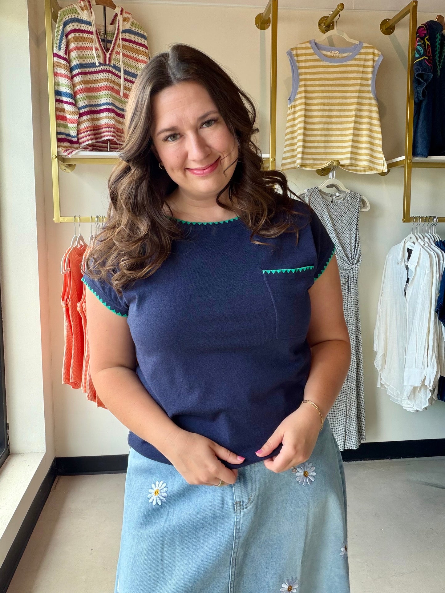 A classic with a handcrafted touch. The Navy Blanket Stitch Sweater features a cozy crew neck silhouette with charming color blanket-stitched detailing and a convenient chest pocket — the kind of piece that looks intentional without trying too hard.

Made from a soft cotton-viscose blend, it's lightweight enough for layering but substantial enough to stand on its own. Pair it with your favorite jeans, white trousers, or a midi skirt for an effortlessly put-together look.

Color blanket-stitched detailing
Sh