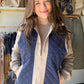 Layer up in style. The&nbsp;Navy Mixed Quilted Vest by Doe &amp; Rae is a versatile outerwear essential that brings warmth and texture together effortlessly. A mixed quilted pattern creates visual depth, while a high neck design and neutral contrast trim along the zipper, shoulders, and pockets give it a modern, polished edge. Zip it over a turtleneck or a cozy long-sleeve — this vest does the heavy lifting.

Why You'll Love It

Mixed quilted pattern — unique texture that stands out from the standard puffer