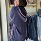 Easel

Embrace cozy vibes with this Navy Embroidered Trim Hoodie. Its relaxed, oversized fit and dropped shoulders ensure endless comfort, while the multicolor ethnic trim adds a fun pop of color. The attached hood tops off this laid-back look, perfect for playful days and chilly nights.