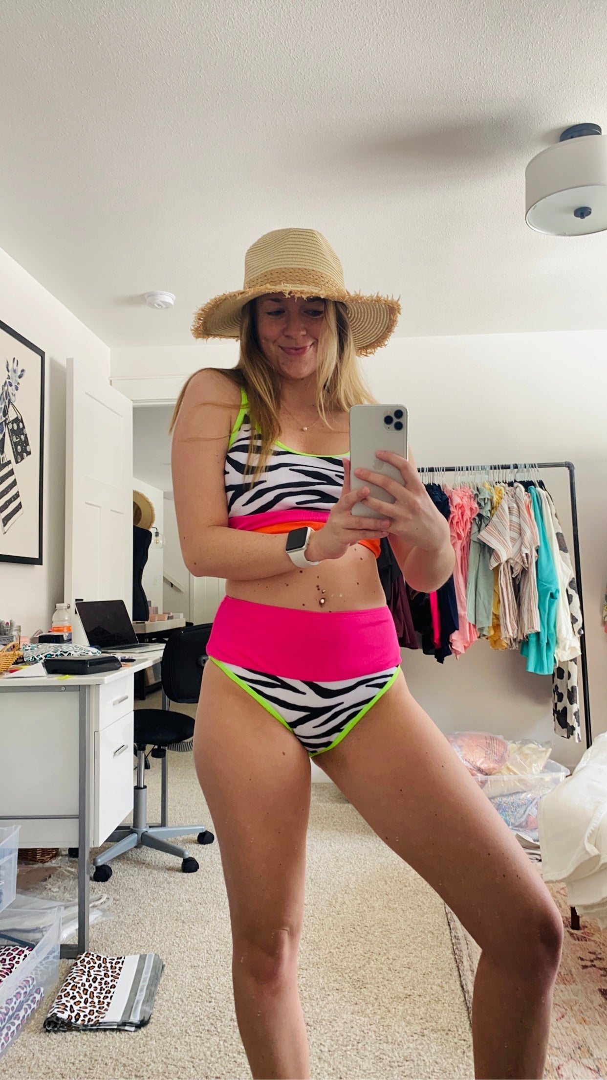Spend your summer strutting on the wild side with this fun two piece swimsuit featuring stretchy material patterned with a black and white zebra print with neon bands, adjustable spaghetti straps, and removable padding!