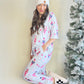 Katy Did

With a dreamy light blue base and adorable holiday details, this set is perfect for matching moments or gifting to your favorite cozy queen. Whether you’re snapping holiday pics or just enjoying the season from the couch, these PJs bring the joy of the season in the comfiest way.