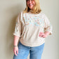Oatmeal Half Sleeve Patchwork Hoodie Effortless layering meets artistic style with this lightweight half sleeve hoodie. Crafted with exposed hems that add contemporary edge, it features delicate floral accents that elevate everyday wear. Perfect for transitional seasons, the relaxed fit and breathable fabric make it ideal for casual outings or cozy evenings. A versatile piece that pairs seamlessly with your favorite basics.