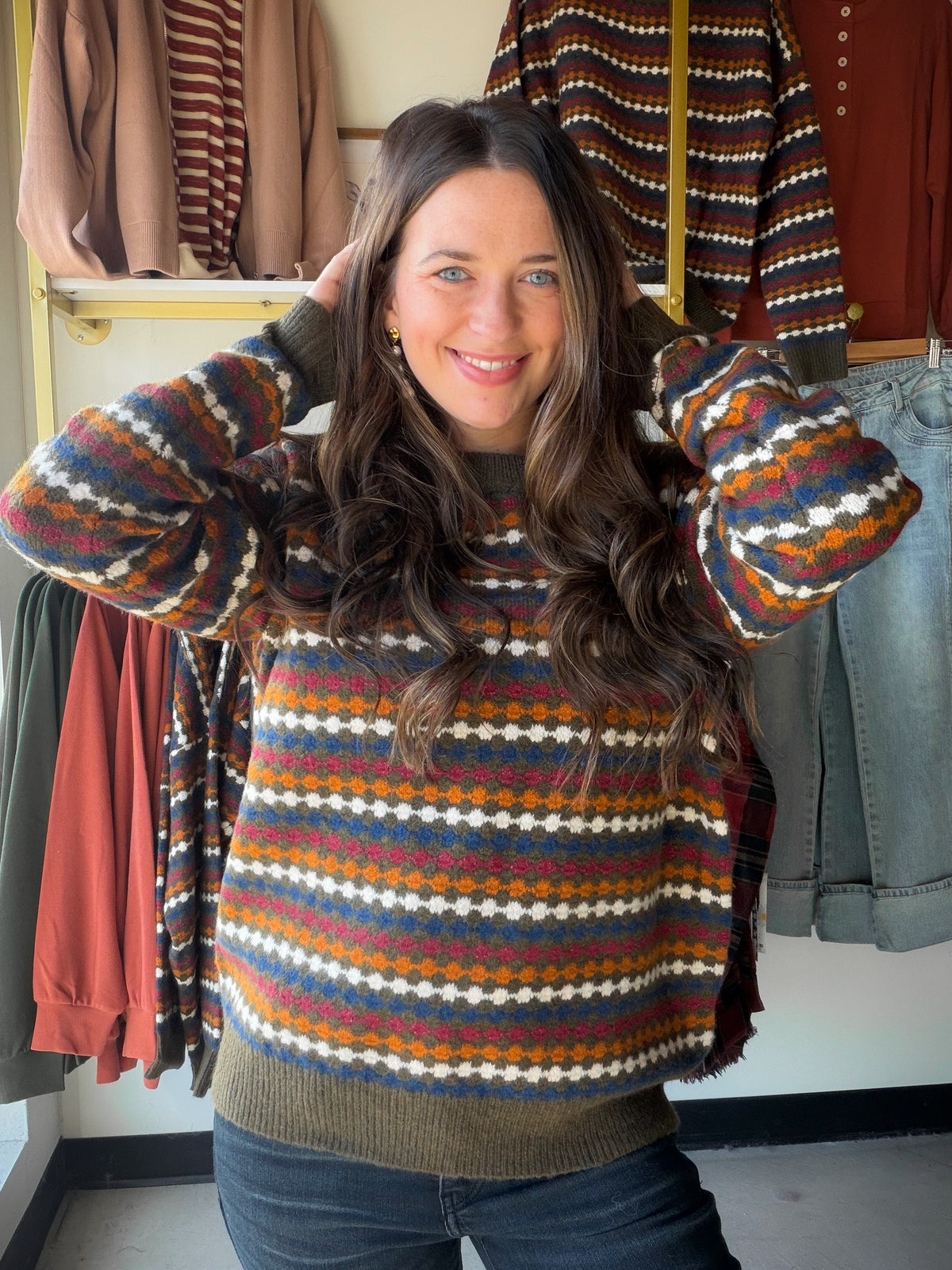 Texture takes center stage in the Olive Honeycomb Stripe Sweater from Staccato. A multi-color honeycomb knit brings depth and dimension to an olive-striped palette, finished with a classic crew neck and long sleeves. It works as hard as your basics but looks far more interesting.

Why You'll Love It

Crew neckline with long sleeves
Multi-color honeycomb texture stripes for rich visual detail
Warm olive palette that anchors autumn outfits
A statement texture in an easy, wearable silhouette
Styling Ideas

Pai