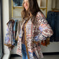 Boho Charm, Boutique Finish

The Olive Trim Floral Patch Top is a standout piece that blends earthy tones with feminine floral detail. Olive trim accents and charming floral patches give this woven top a one-of-a-kind, artisan feel that's anything but ordinary.

Crafted from a 70% Viscose, 30% Nylon blend, it drapes beautifully and feels soft against the skin — the kind of top that looks effortlessly styled whether you pair it with denim, linen trousers, or your favorite wide-leg pants.

Olive trim detailin