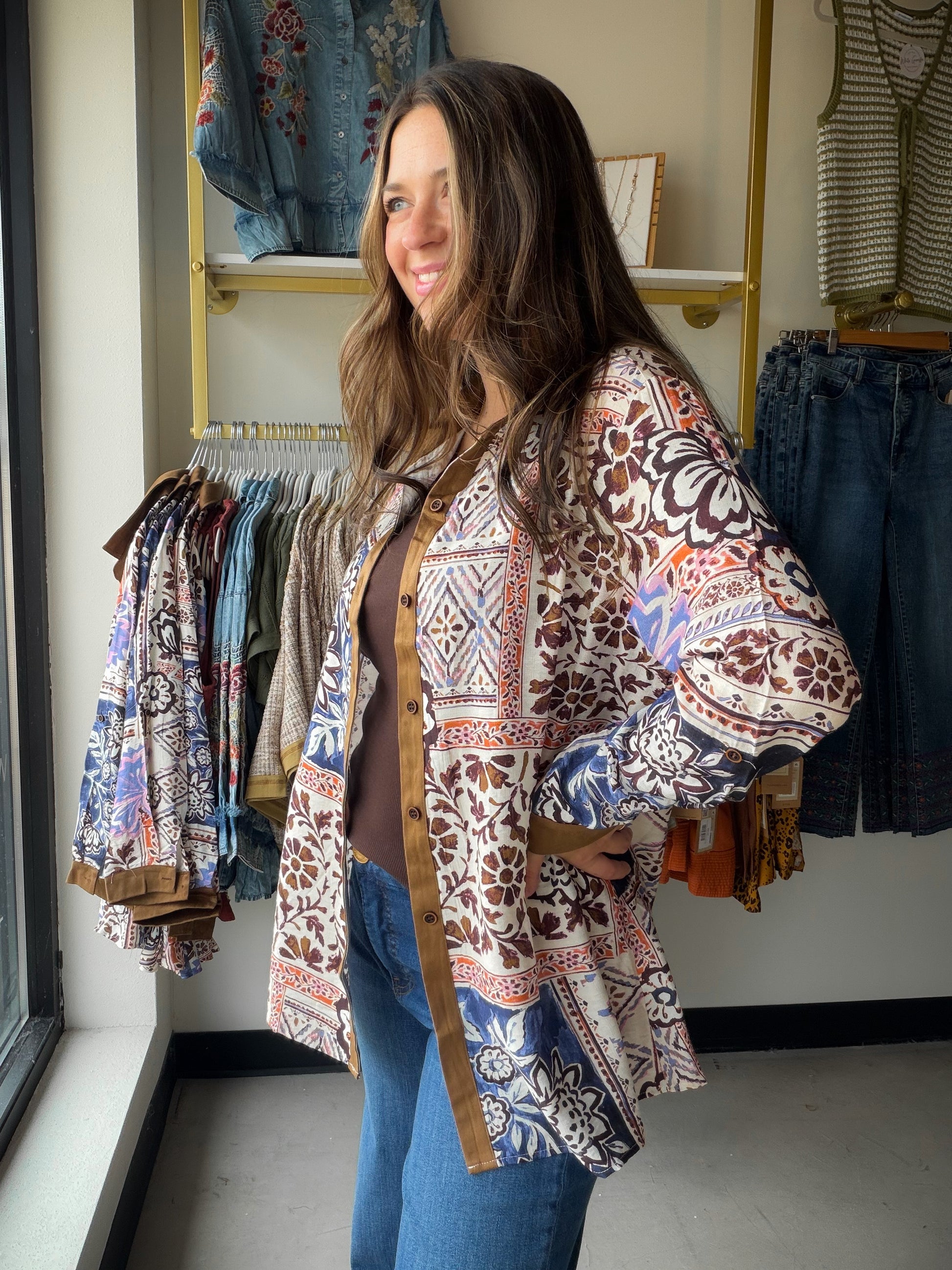 Boho Charm, Boutique Finish

The Olive Trim Floral Patch Top is a standout piece that blends earthy tones with feminine floral detail. Olive trim accents and charming floral patches give this woven top a one-of-a-kind, artisan feel that's anything but ordinary.

Crafted from a 70% Viscose, 30% Nylon blend, it drapes beautifully and feels soft against the skin — the kind of top that looks effortlessly styled whether you pair it with denim, linen trousers, or your favorite wide-leg pants.

Olive trim detailin