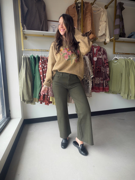 Kut from the Kloth

High-rise wide-leg jeans featuring raw hems and Fab Ab front pockets that comfortably shape and slenderize.
Color: Tuscan Olive
Inseam: 27", Leg Opening: 23", Rise: 10 1/2"
Fabric: 93% Cotton 6% Polyester 1% Spandex