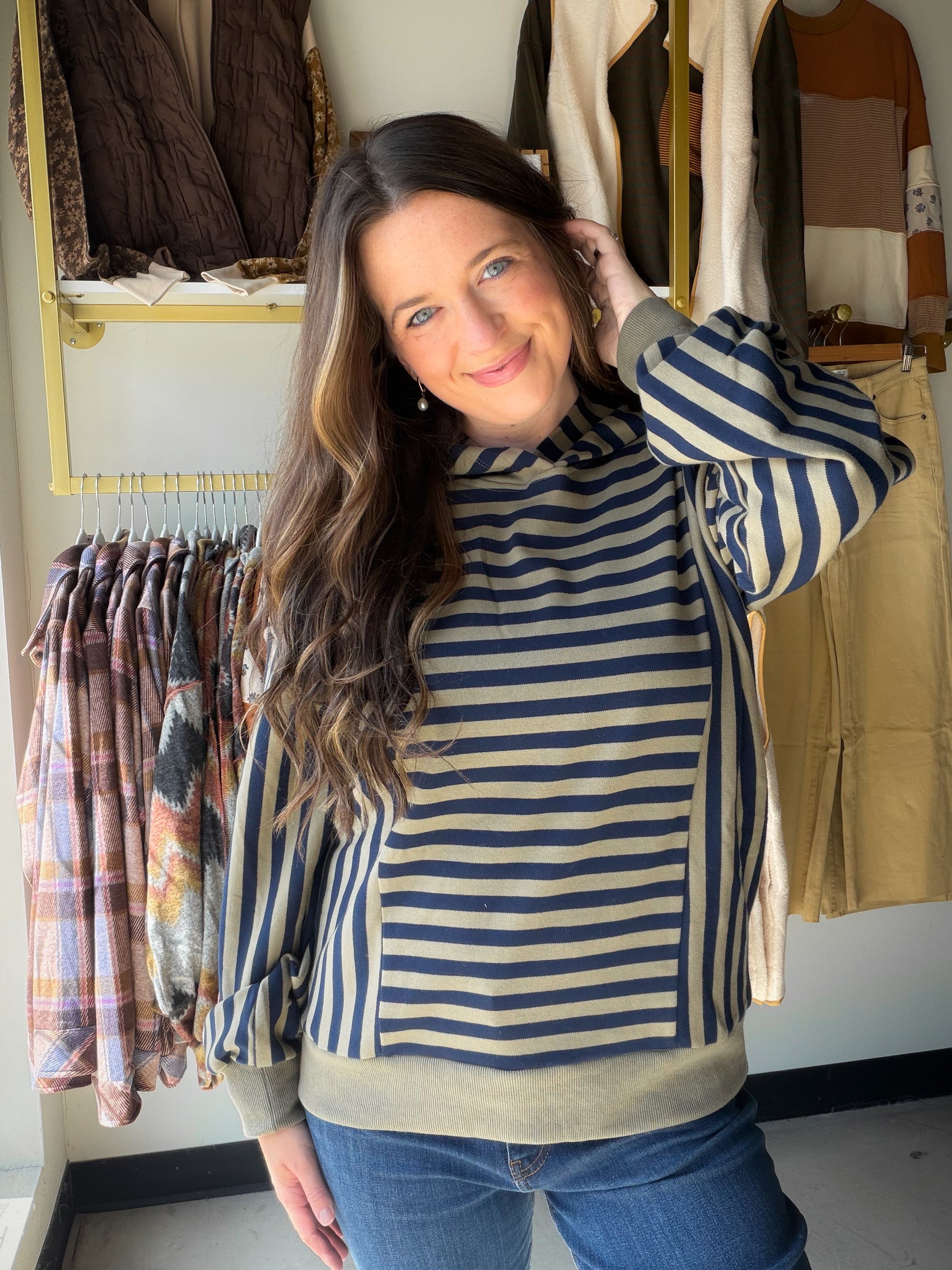 Your new weekend essential. The Cocoa Brushed Stripe Pocket Crewneck by Staccato combines cozy micro-brushed fabric with a subtle stripe mix-media design for a look that's relaxed but anything but basic.

Featuring a classic crewneck silhouette, long sleeves, a chest pocket, and color-trimmed details, this sweatshirt layers beautifully over your favorite tee or under a vest. The soft brushed texture makes it a go-to for cool days when comfort is non-negotiable.

Crewneck silhouette with color trim
Chest poc