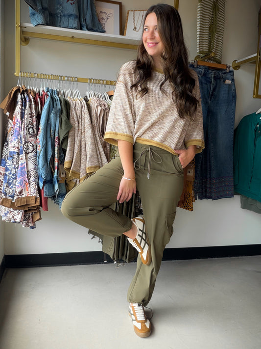 Utility Meets Style

The Olive Cargo Drawstring Pants are the effortless bottom you've been looking for. With a relaxed drawstring waist and functional cargo-inspired details, these pants strike the perfect balance between laid-back and put-together.

Made from a 88% Nylon, 12% Spandex blend, they offer a lightweight feel with just the right amount of stretch — comfortable enough for all-day wear, polished enough to take you anywhere.

Drawstring waist for an adjustable, flattering fit
Cargo-style details f