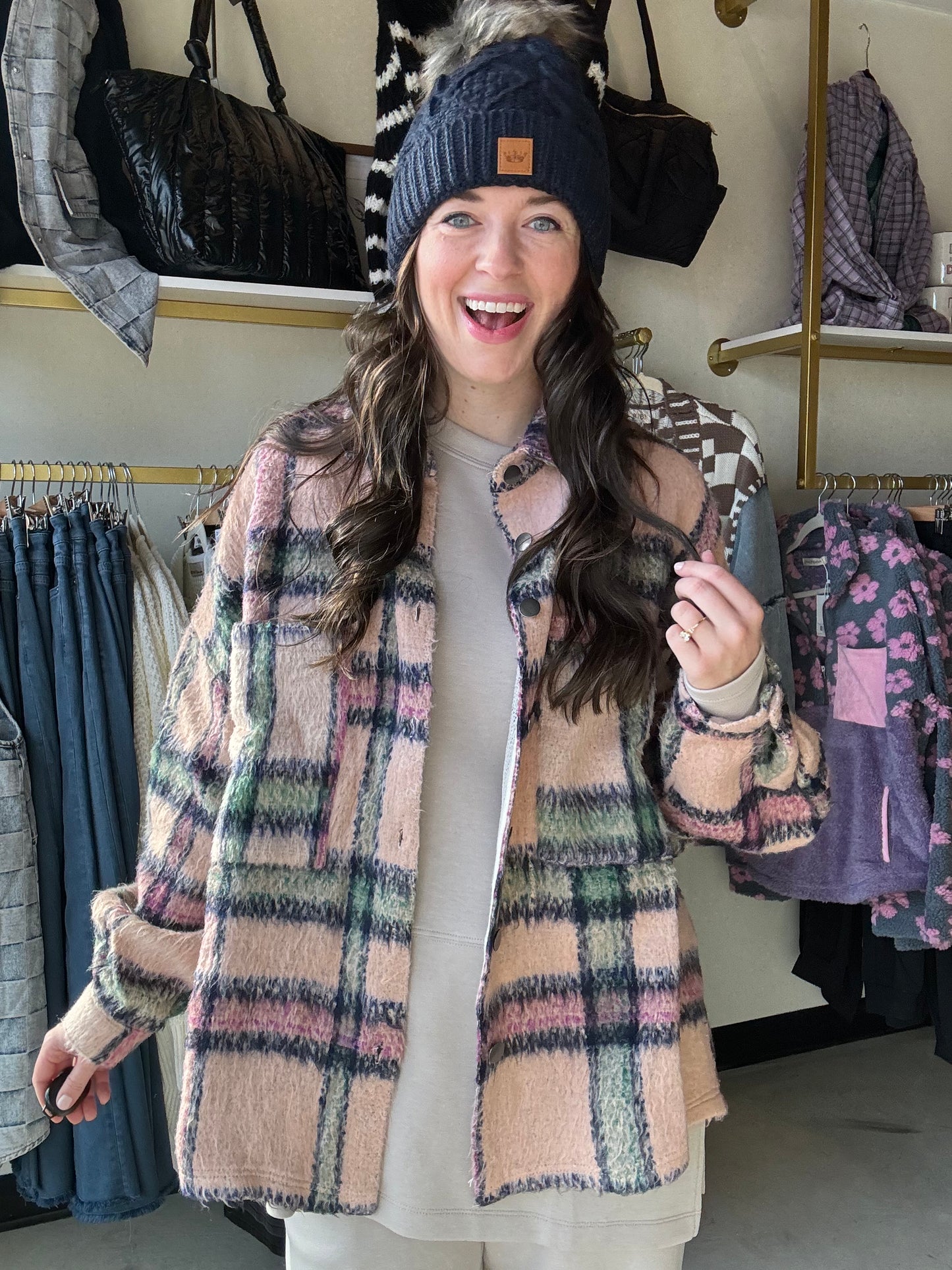 Get ready to elevate your lounge look with this Pink &amp; Navy Plaid Jacket! The beautiful lined plaid design is trendy and oversized, perfect for adding a stylish touch to your favorite lounge set. Plus, the large pockets provide both fashion and function. Stay cozy and chic with this must-have jacket!

Brand: POL