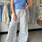 POL

Designed in a straight fit silhouette, these striped woven pants offer an easy, relaxed structure with everyday versatility. The mixed striped pattern adds subtle dimension, while the oversized big patch pockets bring both function and modern edge. Finished with a comfortable elastic waistband with adjustable tie, this style allows flexible fit and effortless wear from casual daytime outings to laid-back weekend looks.

--------------------------------------------------------------------------
Fabric C