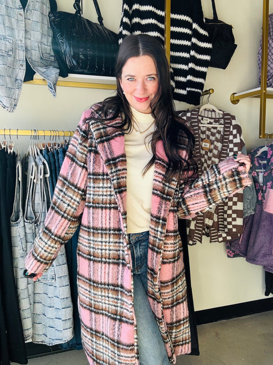 Brand: Panache

As a cozy and bright winter jacket, the Pink Plaid Button Up Coat will keep you warm during the cold season. Its lining adds extra comfort and pairs well with sweaters for a put-together outside look. Perfect for those who want to stay stylish and comfortable in the winter.