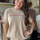Southern Grace

Fit: Relaxed
Runs Large
Unlined
Some Stretch
Crew Neck
Standard T-Shirt Length
Printed in Texas
Fabric &amp; Care

Material: 100% Cotton
Care Instructions: Hand Wash with Cold Water, Do Not Bleach, Hang or Line Dry