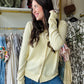 Experience comfort and style with this pastel yellow sweater cardigan, crafted from buttery soft material for a gentle touch against your skin. Featuring fully functioning front buttons, it offers versatile wear options, while ribbed cuff details add subtle texture and a refined finish. The beautiful pastel yellow hue brings a fresh, elegant pop of color to any wardrobe, perfect for layering in cooler weather.