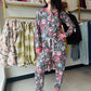 Get cozy in our Paw Print Jogger PJ Set. With its adjustable satin drawstring and elastic waistband, you'll stay comfortable all night long. Plus, the jogger bottom and pocket on the bottom add a touch of functionality to these stylish pajamas. Treat yourself to a good night's sleep with this PJ set.

Shirley &amp; Stone&nbsp;