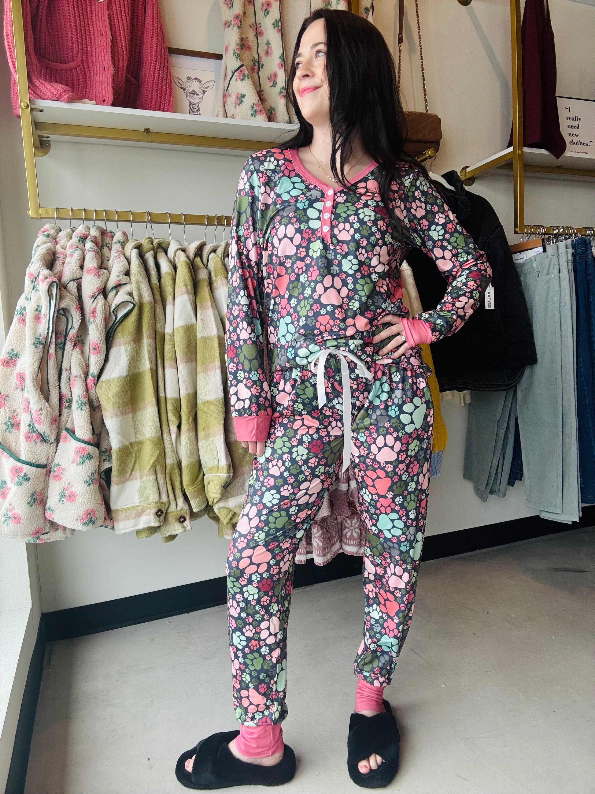 Get cozy in our Paw Print Jogger PJ Set. With its adjustable satin drawstring and elastic waistband, you'll stay comfortable all night long. Plus, the jogger bottom and pocket on the bottom add a touch of functionality to these stylish pajamas. Treat yourself to a good night's sleep with this PJ set.

Shirley &amp; Stone&nbsp;