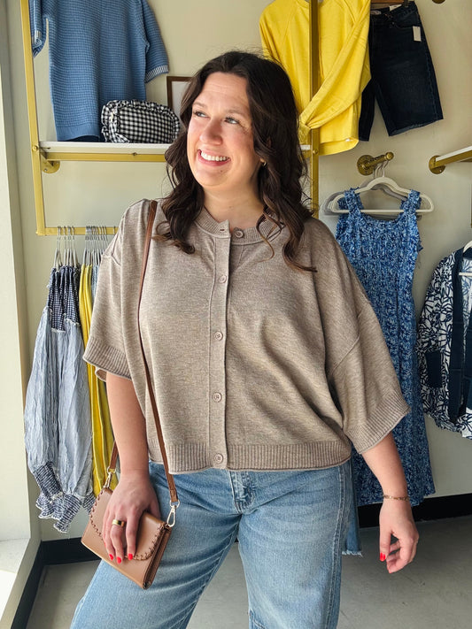 Cotierra

Experience cloud-like luxury with this elevated cashmere-blend cardigan in a stunning, versatile peanut hue. Featuring a chic boxy fit and breezy elbow-length sleeves, the Goldie is the high-impact layer your wardrobe has been craving.

Cloud-like softness for all-day comfort.
Chic oversized fit for effortless layering.
Breathable cotton-blend for year-round wear.
Elegant elbow-length sleeves for breezy style.
Polished ribbed detailing for elevated looks.
Versatile button-front for custom styling.