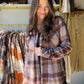 The perfect transitional layer has arrived. This cozy plaid shacket from&nbsp;Panache combines a warm tan base with a pop of periwinkle for a color combo that’s anything but basic. Soft, stretchy, and endlessly versatile — wear it open over a tee or buttoned up as a standalone top.

Eye-catching tan &amp; periwinkle plaid pattern — a fresh, boutique-exclusive colorway
Soft knit fabric with a comfortable stretch: 68% Polyester / 28% Rayon / 4% Spandex
Relaxed, layerable silhouette that works as a shacket or 