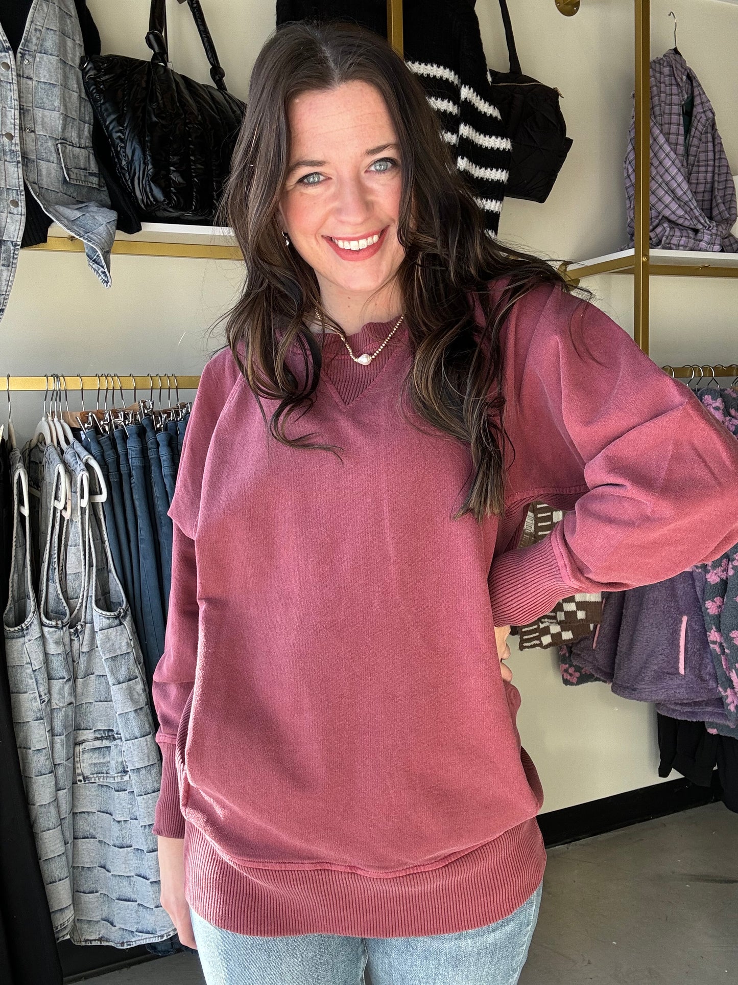 Our best-selling pullover is back in another color! Expertly crafted, this Pigment Dyed Pullover will keep you warm and stylish in the cooler seasons. Made of 100% cotton French terry, the ribbed detailing adds a touch of sophistication to this casual sweatshirt. With convenient pockets it's the perfect addition to your wardrobe.

Brand: Zenana