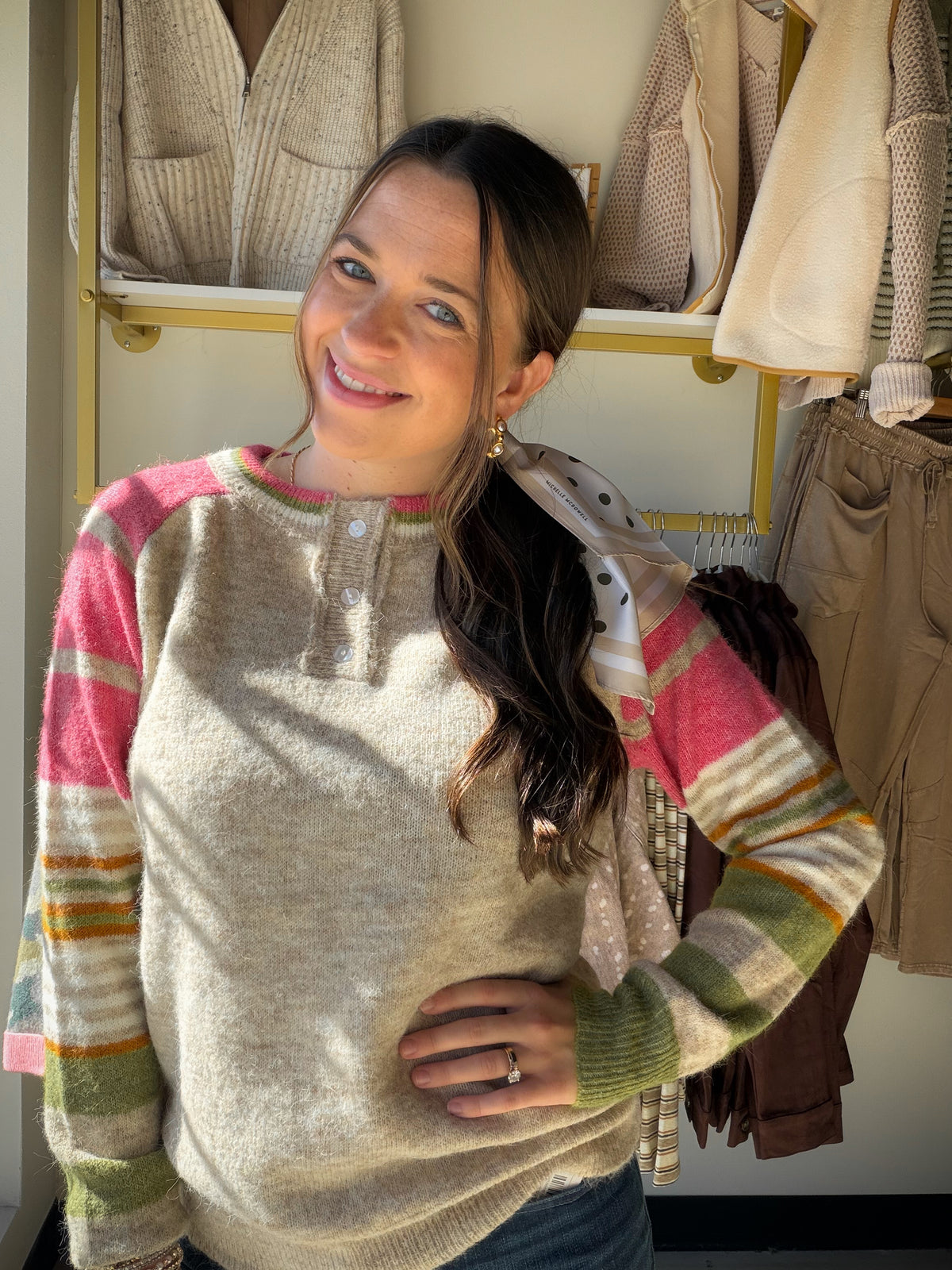A Little Pink, a Lot of Personality

The Pink Accent Sleeve Sweater by Staccato brings a playful touch to sweater weather with striped sleeves, half-button detailing, and a fuzzy texture. A crew neckline keeps the look classic, while the pink accents give this pullover a little something extra.

Picture a crisp afternoon, a warm coffee in hand, and your favorite denim paired with this textured sweater. It’s an easy outfit for lunch with friends or a weekend wander, with enough detail to make simple styling 