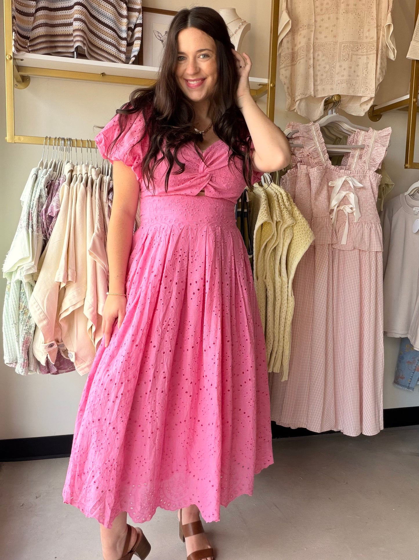 Sweet, summery, and utterly feminine — the Pink Crochet Puff Sleeve Dress by Gigio is the kind of dress that turns heads effortlessly. Crafted from 100% cotton, this eyelet midi dress features a beautifully textured crochet construction with a print twist bodice and elastic shoulders for a flattering, easy fit. Puff sleeves add a romantic, editorial touch, while the pleated midi skirt creates graceful movement with every step. Fully lined for a polished finish.

Details:

Eyelet crochet fabric throughout
Pr