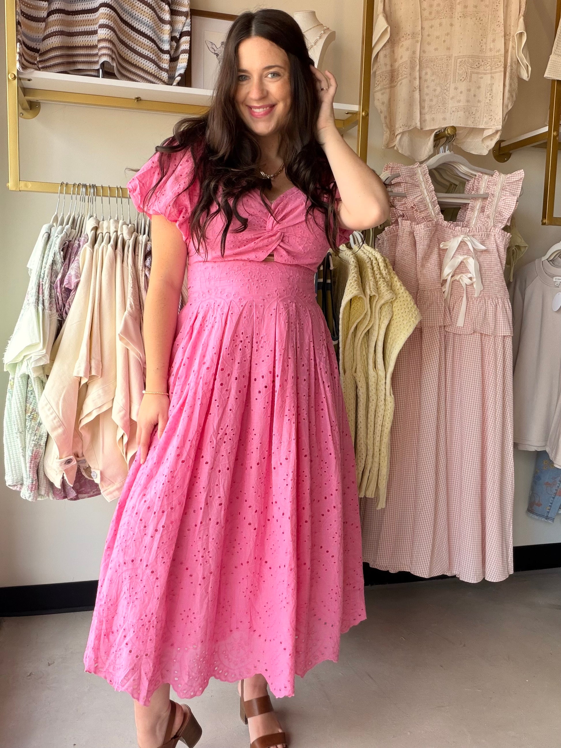 Sweet, summery, and utterly feminine — the Pink Crochet Puff Sleeve Dress by Gigio is the kind of dress that turns heads effortlessly. Crafted from 100% cotton, this eyelet midi dress features a beautifully textured crochet construction with a print twist bodice and elastic shoulders for a flattering, easy fit. Puff sleeves add a romantic, editorial touch, while the pleated midi skirt creates graceful movement with every step. Fully lined for a polished finish.

Details:

Eyelet crochet fabric throughout
Pr