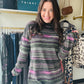 Tribal

Wrap yourself in cozy charm with the Pink Flambe Mock Neck sweater. Its super soft striped fabric feels like a gentle hug, while the playful mock neckline adds a touch of fun flair. Perfect for layering, it pairs beautifully with a vest to keep you warm and stylish on chilly days.
